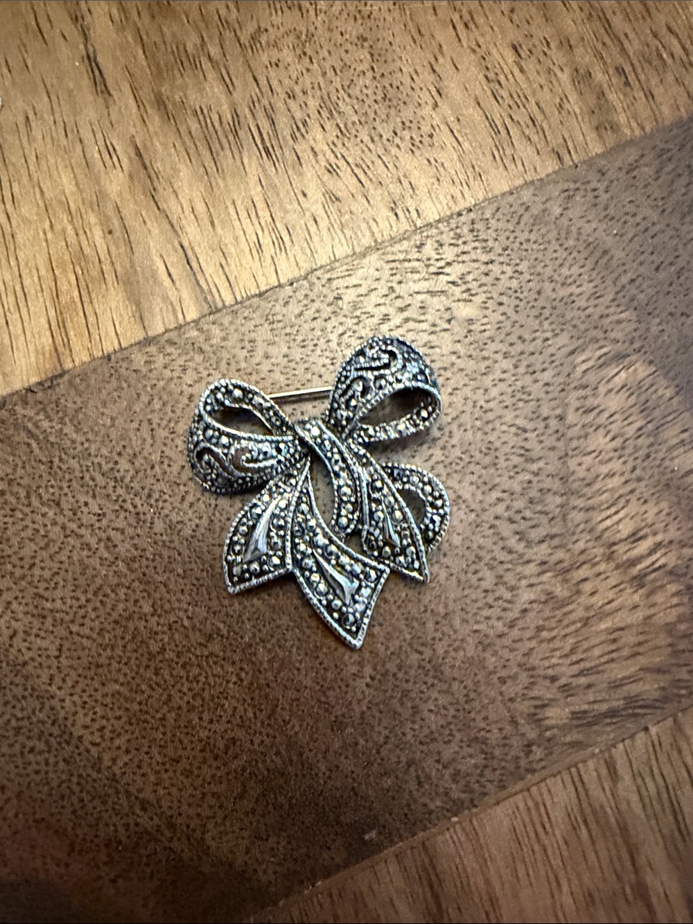 Vintage-Inspired Silver Bow Brooch with Marcasite Accents